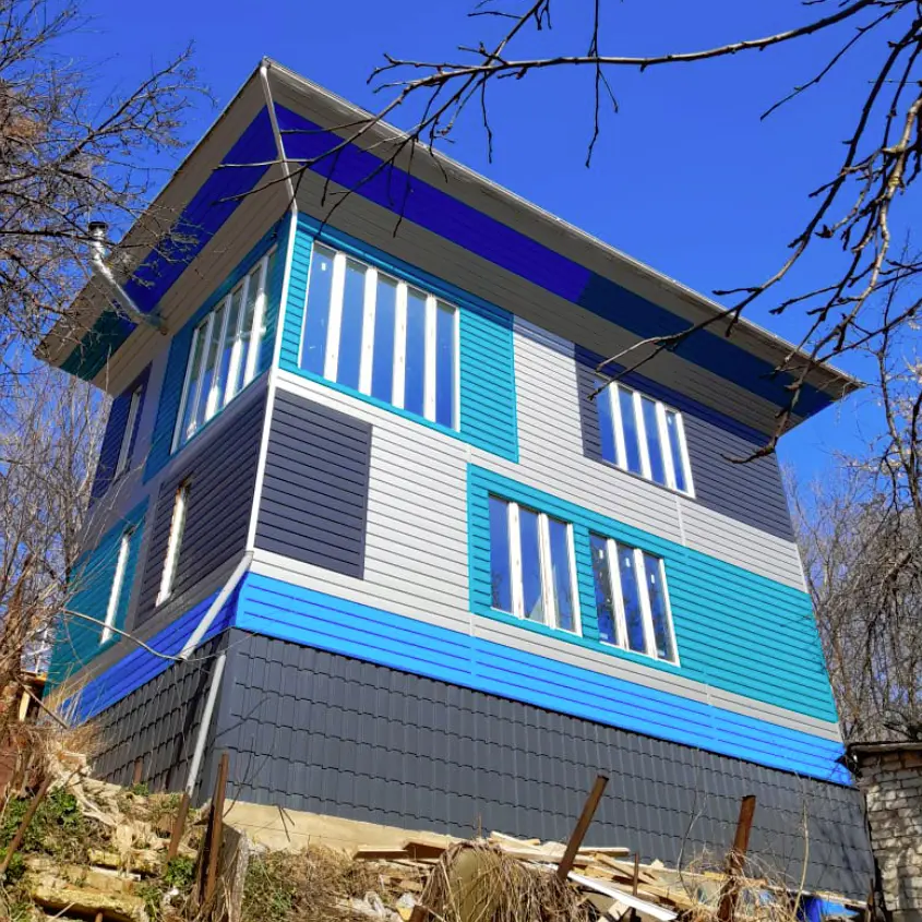 Фото 1 дома Перевертыш металлосайдинг Евро-Брус под брус в ассортименте